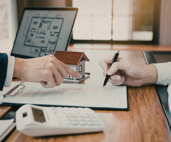 Homebuyer signs real estate contract